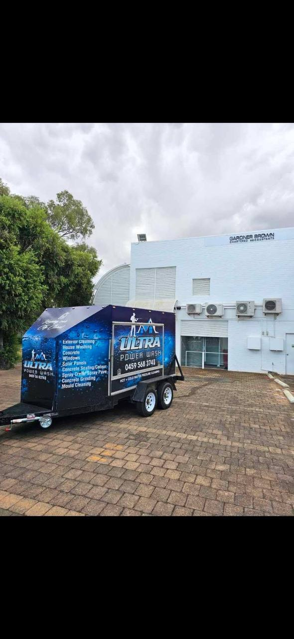 Ultra Power Wash trailer on site at a commercial building