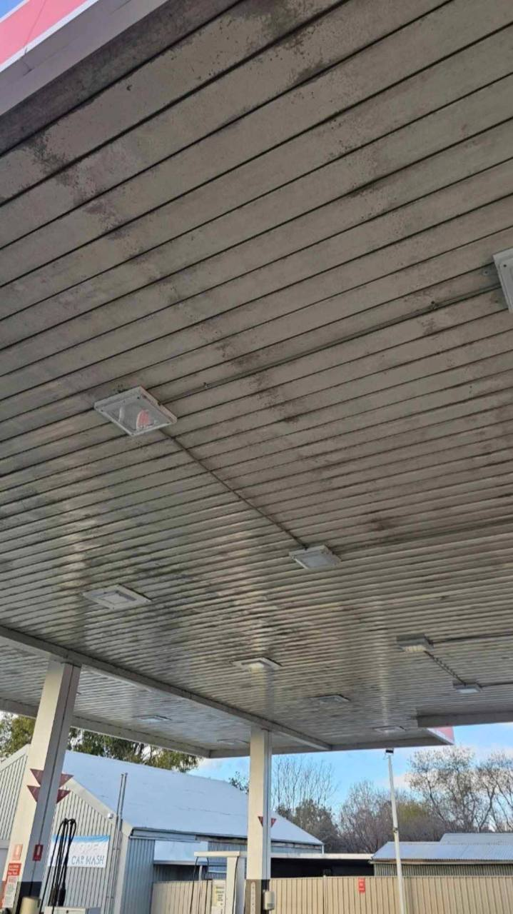 Service station canopy before cleaning